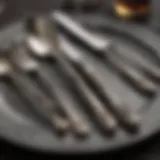 Detailed view of tarnished silverware before cleaning