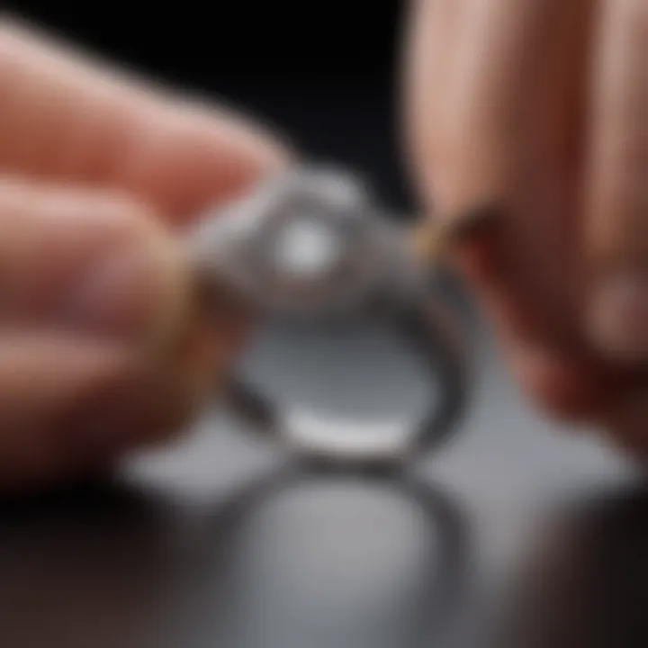 A close-up of a diamond ring being gently cleaned with a soft brush