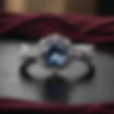 Elegant engagement ring displayed on a velvet surface