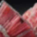 Close-up view of rhodochrosite crystal showcasing its vibrant pink and white banding