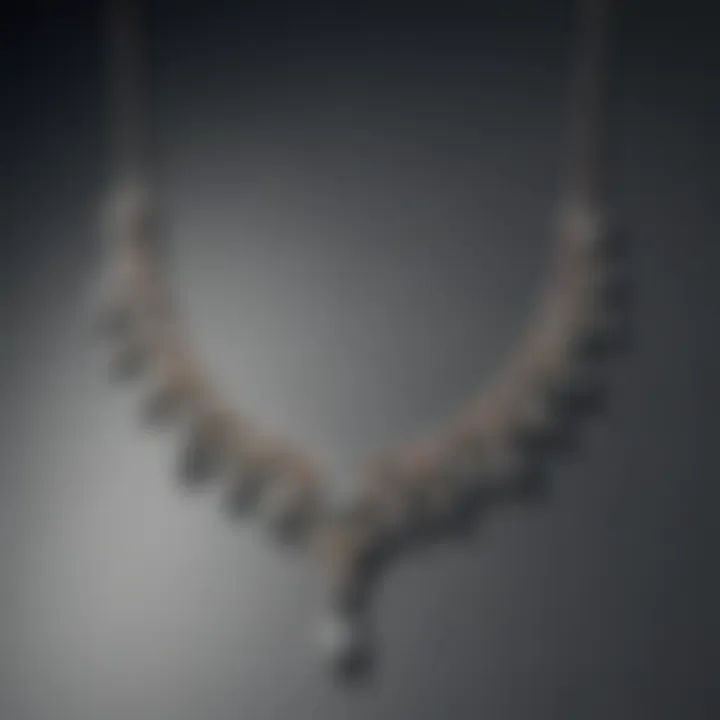 A collection of old mine cut diamond necklaces in various settings