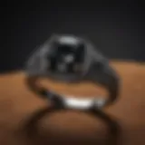 Stunning black diamond ring on a velvet surface