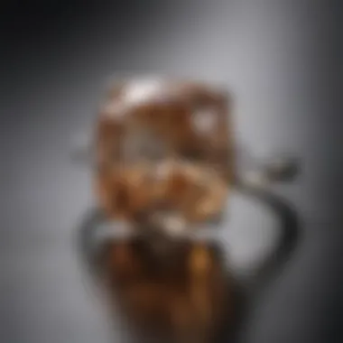 A close-up shot of an elongated cushion diamond ring reflecting light in a natural setting